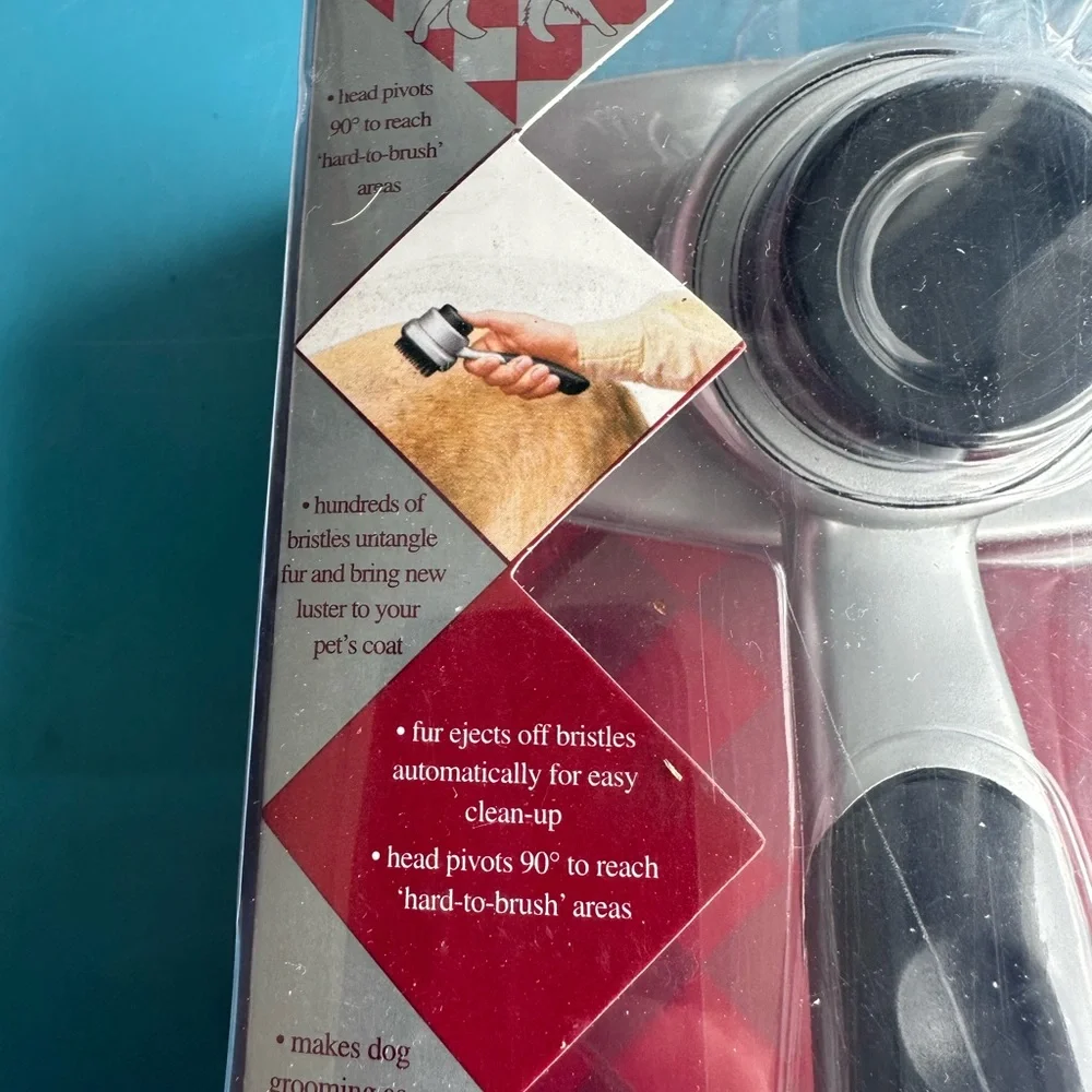 Silver and Black Self-Cleaning Pet Brush